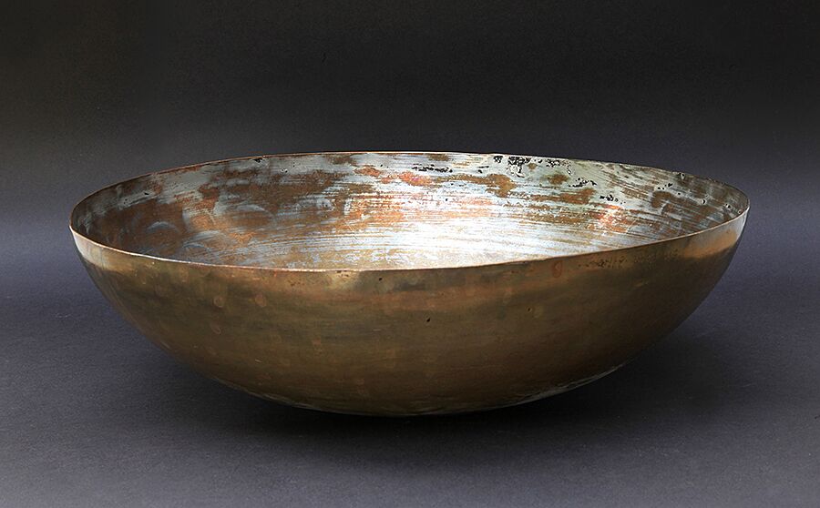 In the 1920s Arunkant Shah’s grandfather brought this brass cooking pot from India to East Africa. It was originally a plate and Shah’s aunt Laxmiben formed it in  into a wok or karai in the 1940s after learning the craft from the iron making community