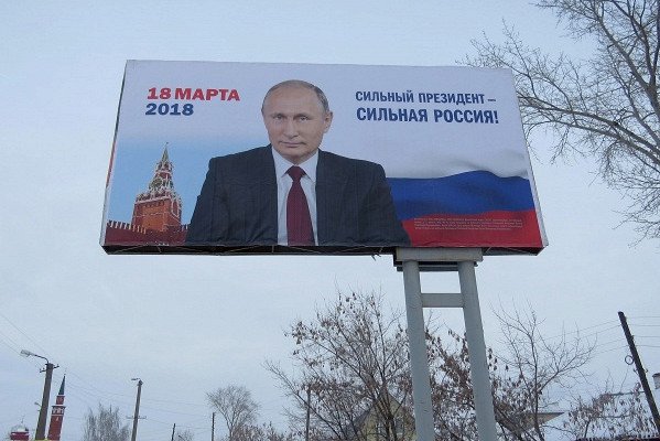 Владимир Владимирович как бы говорит нам:
"Россияне, следующие 6 лет для вас будут такими же бессмысленными, как этот плакат, и такими же унылыми, как моё ебало на нем."