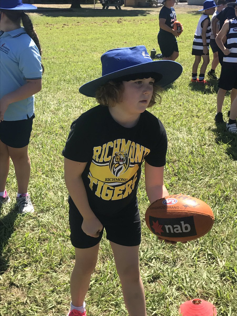 WPS34_2018's tweet photo. Today's action with Geelong Football Club. Developing our skills - kicking, tackling, hand balling and marking- through fun drills. Thanks @GeelongCats #afl2018 #geelongcats https://t.co/8PY7IqoEAB
