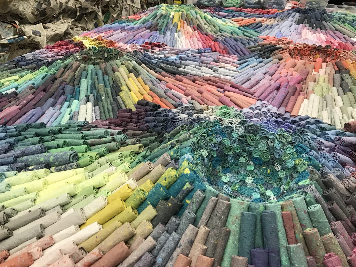 We turned my client’s clothing, baby blankets and even their doggy’s bandanas into paper, then rolled it for this #art #commission.