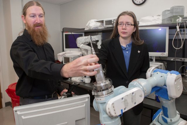 UC_CEAS's tweet image. #TechTuesday: Tess could reduce workplace injuries &amp;amp; potentially perform surgery in space. No doubt, she&apos;s our new favorite robot. Fist bumps to UC professors Drs. Catharine McGhan &amp;amp; Tamara Lorenz for their work! magazine.uc.edu/editors_picks/…