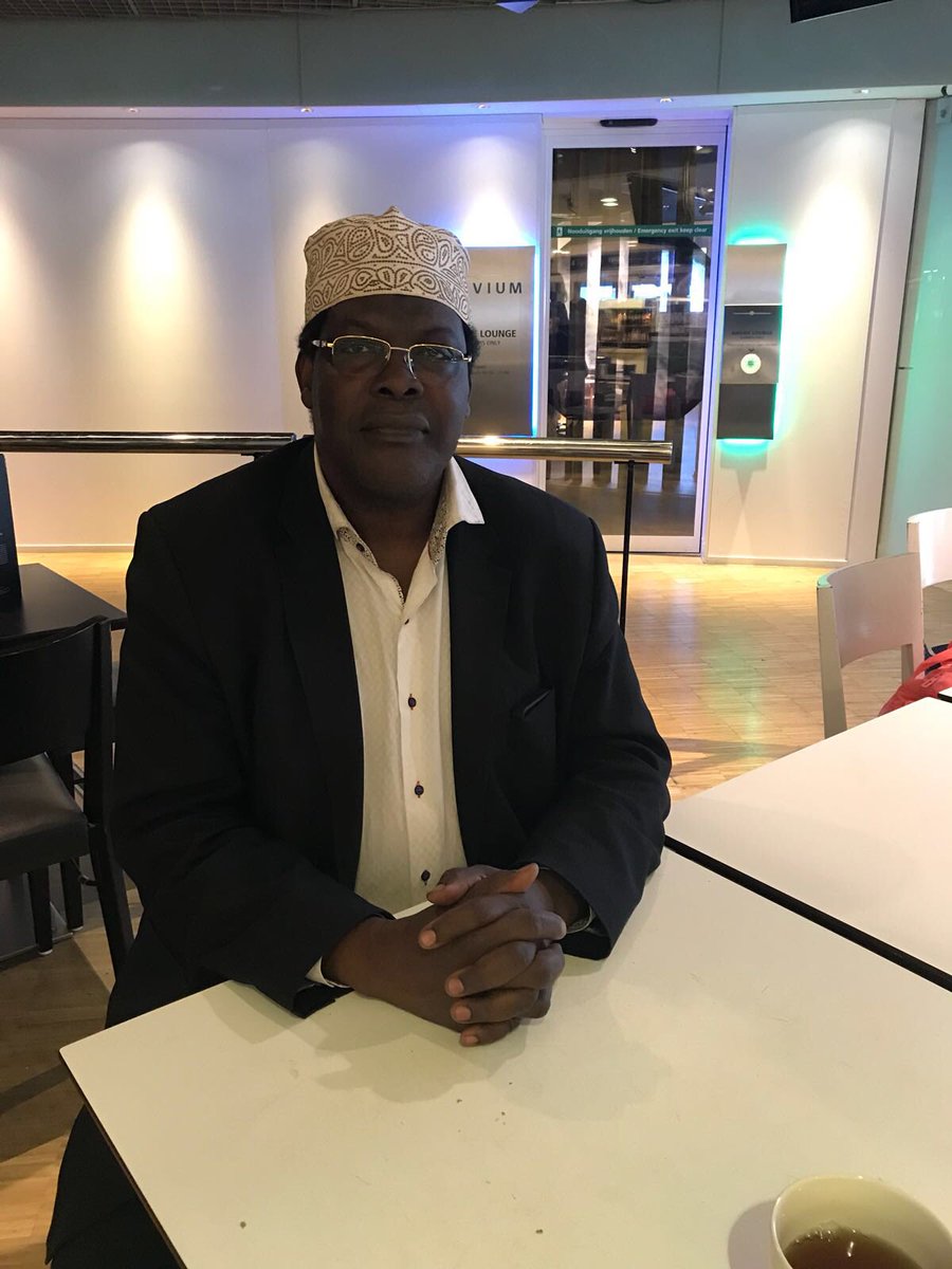 MboyaApollo's tweet photo. Miguna is fine at Schiphol Airport Amsterdam, he has told me share this photo &amp; to assure the Nation that he will be back soon https://t.co/N7GIgy3hH1