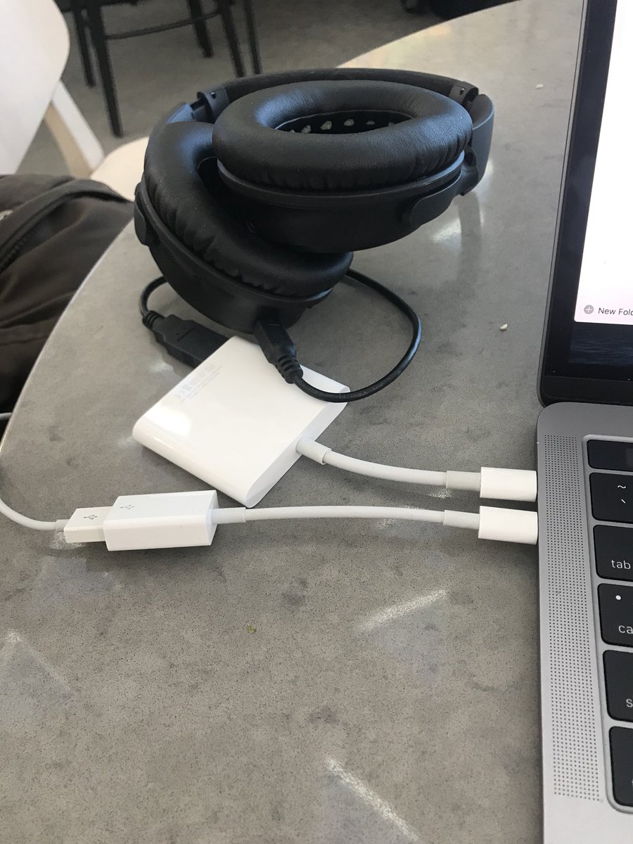MolloyAlex's tweet photo. Standard adaptor mess trying to plug in two USB peripherals. Thanks Apple. https://t.co/qy3sFO1KeU
