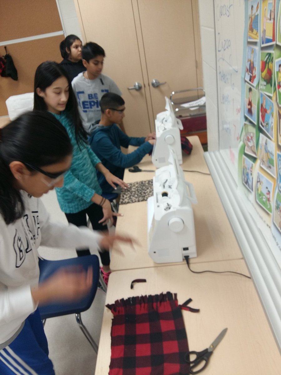 JASSService's tweet photo. Learning how to make hats today with @MsMK_PDSB on this snowy school day... because why not? @JeanAugustineSS #familystudies #lifeskills https://t.co/1Fma3ZlsFY