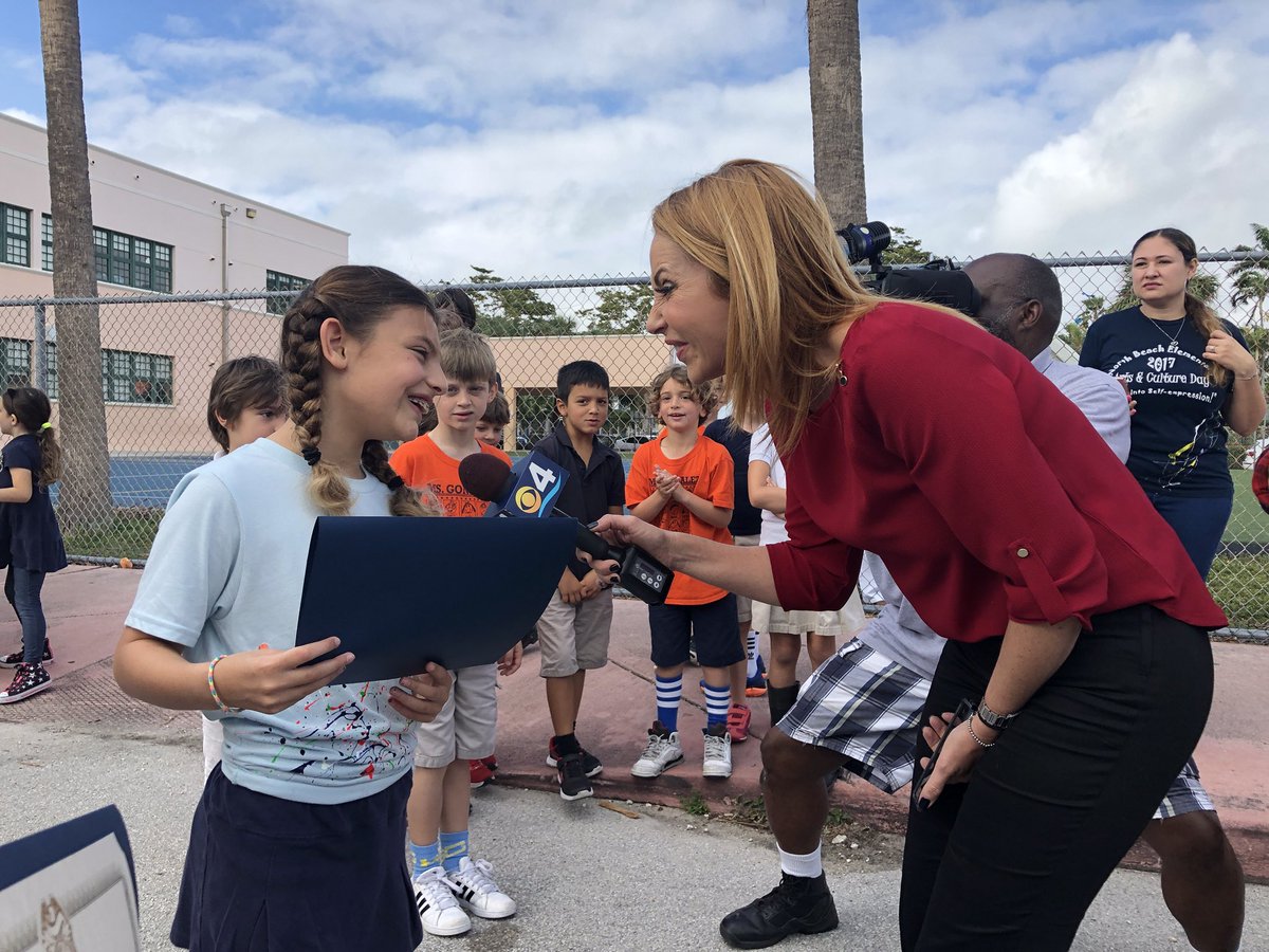 MiamiBeachPD's tweet photo. .@MarybelCBS4 is here with @CBSMiami for the #UnityBikeRide! The smiles speak for themselves! https://t.co/NDznnBcDRI