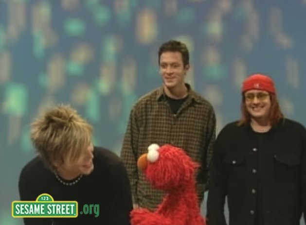 AbsoluteGoo's tweet photo. For your Wayback Wednesday, @googoodolls fans, how about we all show a little 'Pride' today, and watch the Goos with Elmo? "let those good thoughts fill your head" 🎵 https://t.co/H6KixlbMmx #sesamestreet #elmorocks #googoodolls https://t.co/fEyA6fIIal