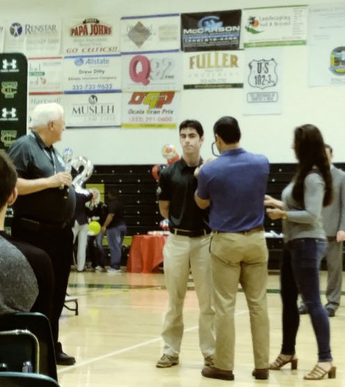 TCHSCeltics's tweet photo. What an honor to have your father pin your wings on your lapel! Camp completed "ground school" through TC's ERAU Aerospace Career Academy, then took private flying lessons via an outside flight school. Wings signify Camp's receipt of his private pilot's license. Congrats, Camp! https://t.co/zDS6c0UYjS