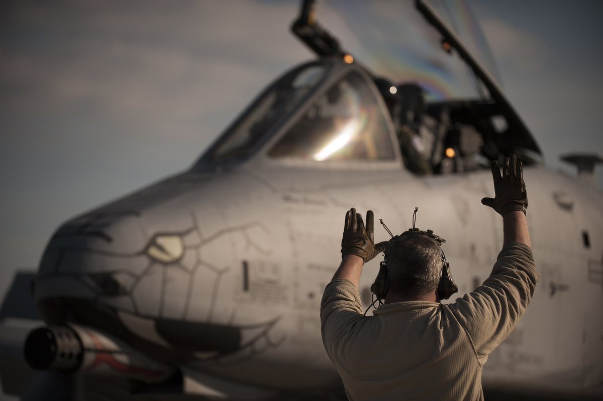USNationalGuard's tweet photo. Photo of the Day: An @INGuardsman, with the 122nd Fighter Wing, marshals an A-10C "Warthog" aircraft after a successful mission during Operation Guardian Blitz: https://t.co/5HdrC58UwD https://t.co/DBayGRFmwL