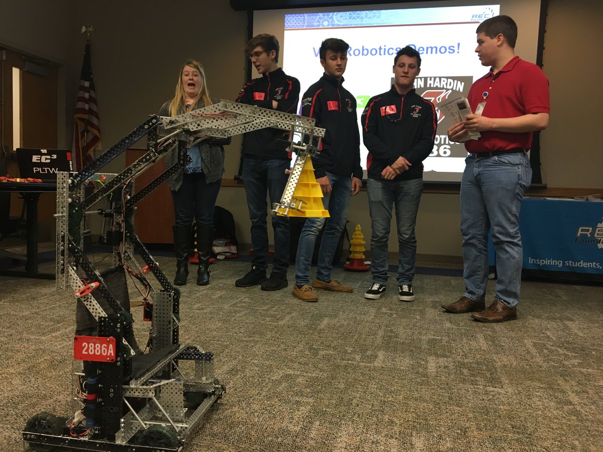 REC_Foundation's tweet photo. John Hardin High School presenting a demo of their #VEXRobotics robots @UPS Volunteer Recruitment workshops in KY recently. They shared #STEM experiences, goals for the future, &amp; even let folks drive their robots after the session. #omgrobots https://t.co/UIGXt77pLK