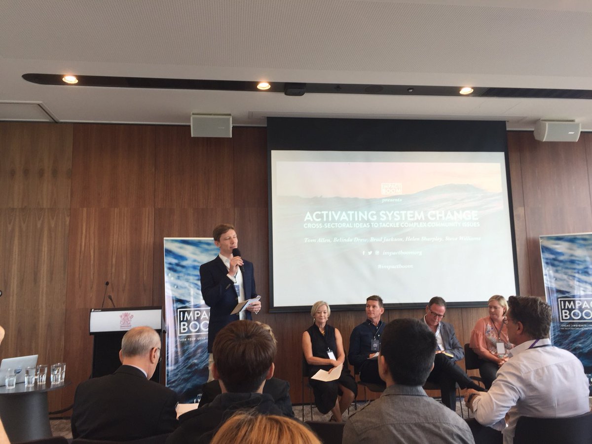 At #impactboom breakfast. <a href="/TomAllenDesign/">Tom Allen</a> leading the panel discussion on activating system change