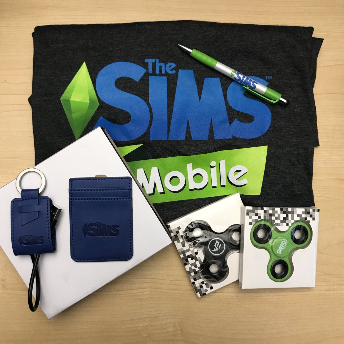 SimGuruKate's tweet photo. Holy smokes, I am nearly at 2K followers. I think this calls for another swag #giveaway! Retweet this tweet and make sure you are following me and I will choose a random winner at 10 am Monday, February 12th. Winner will receive everything in the picture! https://t.co/pZOIWQ2wLT