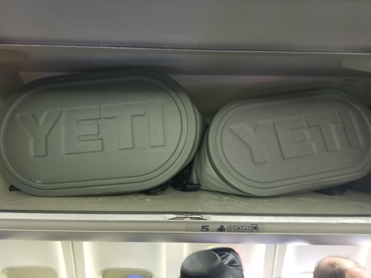 FergoliciousBBQ's tweet photo. In case anybody was wondering, the @YETICoolers Hopper 30 & 20 fit perfectly in the overhead compartment on a @SouthwestAir flight. They are carrying a full @KCBBQSOCIETY contest (chicken, ribs, pork and brisket). #RubSumLUV #BBQnation #Yeti #Keepinitcold #Yetiup #ourmeatflys https://t.co/17W6ii1oGr