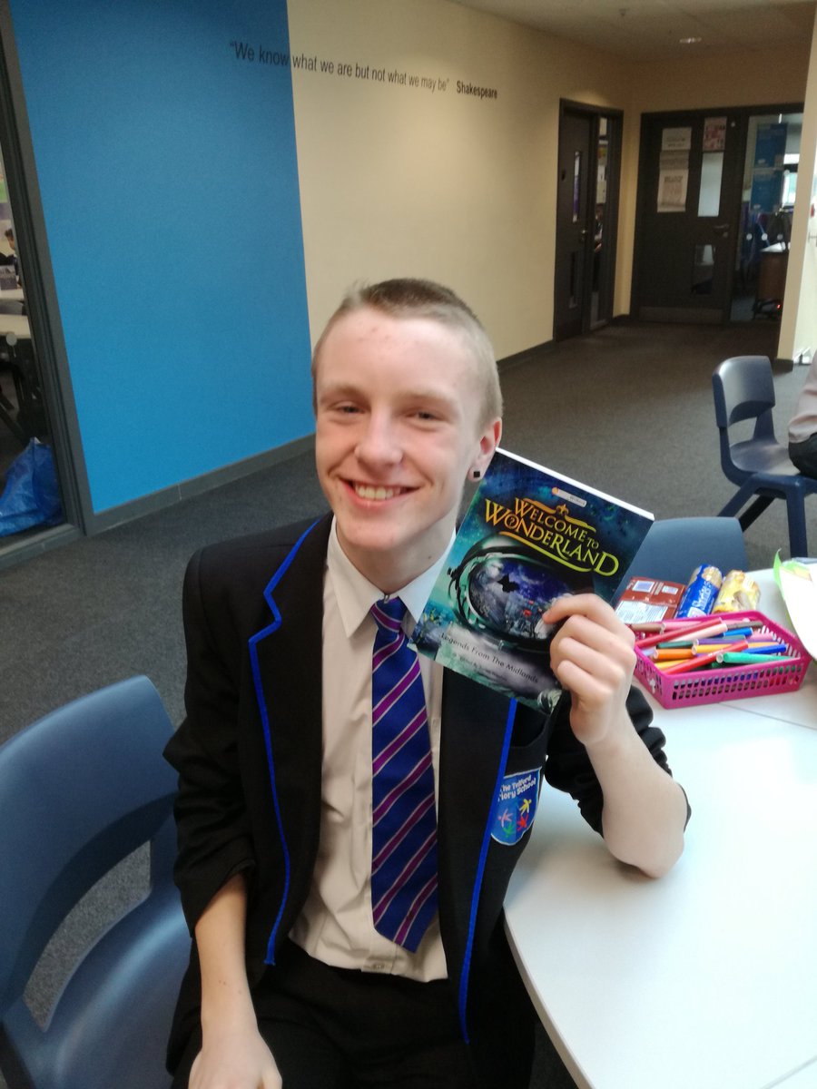 EnglishTPS's tweet photo. Mike, published author, with his book. Congratulations to all the students who were published in  #welcometowonderland. Tweet us back with your picture. #youngwriters #englishisamazing #MissTabberer https://t.co/xjrlAK6fmn