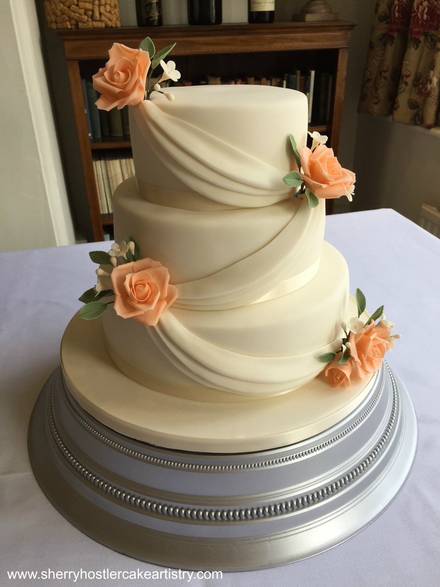 SherryHostlerCA's tweet photo. You don't see much swagging on cakes these days, but I have to say I think it looks really effective. So cheers to the old skool x @WManorWeddings #weddingcake #fivearrowshotel #waddesdon https://t.co/tgy9Xh6G0g