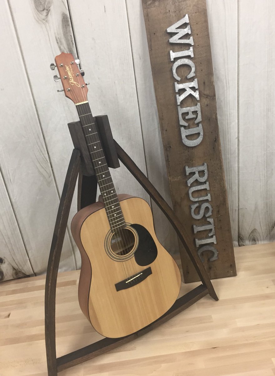 wickedrustic's tweet photo. What do you get when you cross a whisky barrel, sweet music, and hard work? The @wickedrustic Barrel Stave Guitar Stand! Who wants one?
#rusticfurniture
#wickedrustic
#refurbishedfurniture
#customfurniture
#custommade
#renonv
#renotahoe
#madeinnevada
#battleborn
#nevadamade https://t.co/MZKgPhyQX0