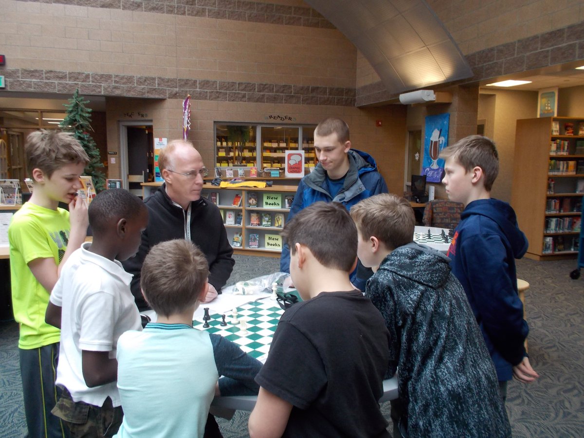 HMSDiscoveryDen's tweet photo. Mr. Wolf's Chess Club learning from the "master". @HMS_huskies #learnbps #bpslms https://t.co/3oUkrzVXk6