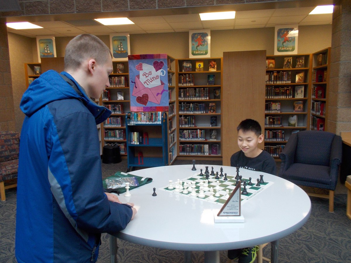 HMSDiscoveryDen's tweet photo. Mr. Wolf's Chess Club learning from the "master". @HMS_huskies #learnbps #bpslms https://t.co/3oUkrzVXk6