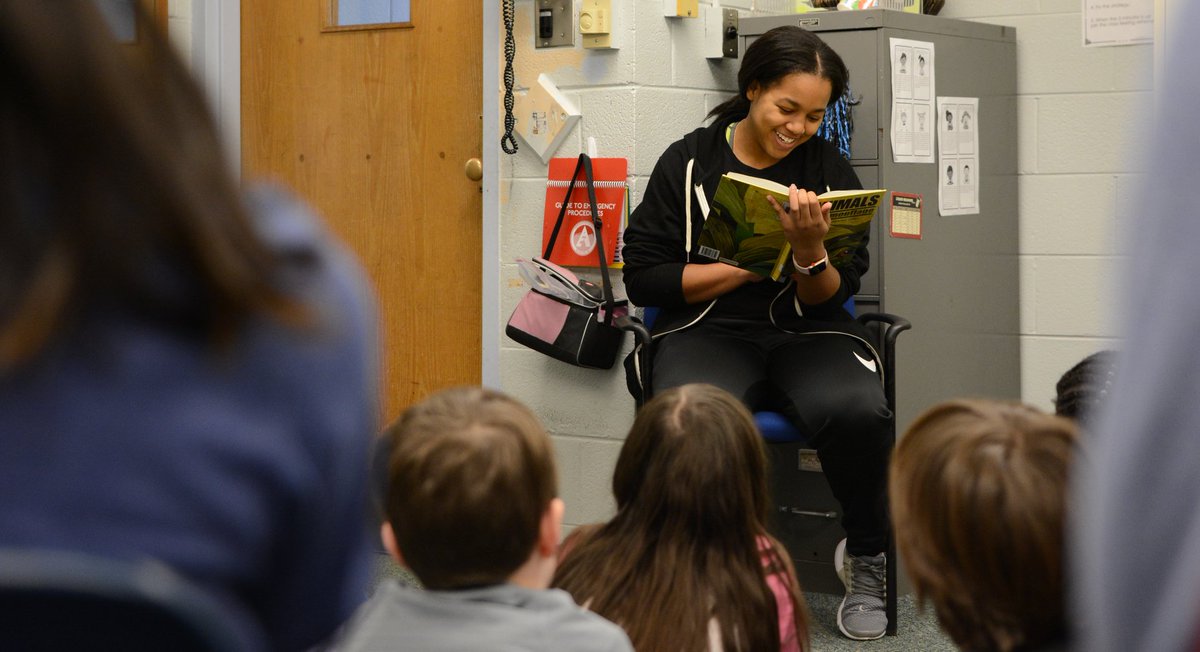 In preparation for Friday's Elementary Night, Asheville High 🏀 Players are reading to some of their youngest fans. They're also sharing best practices on how to balance being both a great student and athlete. #TheACSWay facebook.com/pg/AVLCityScho…
