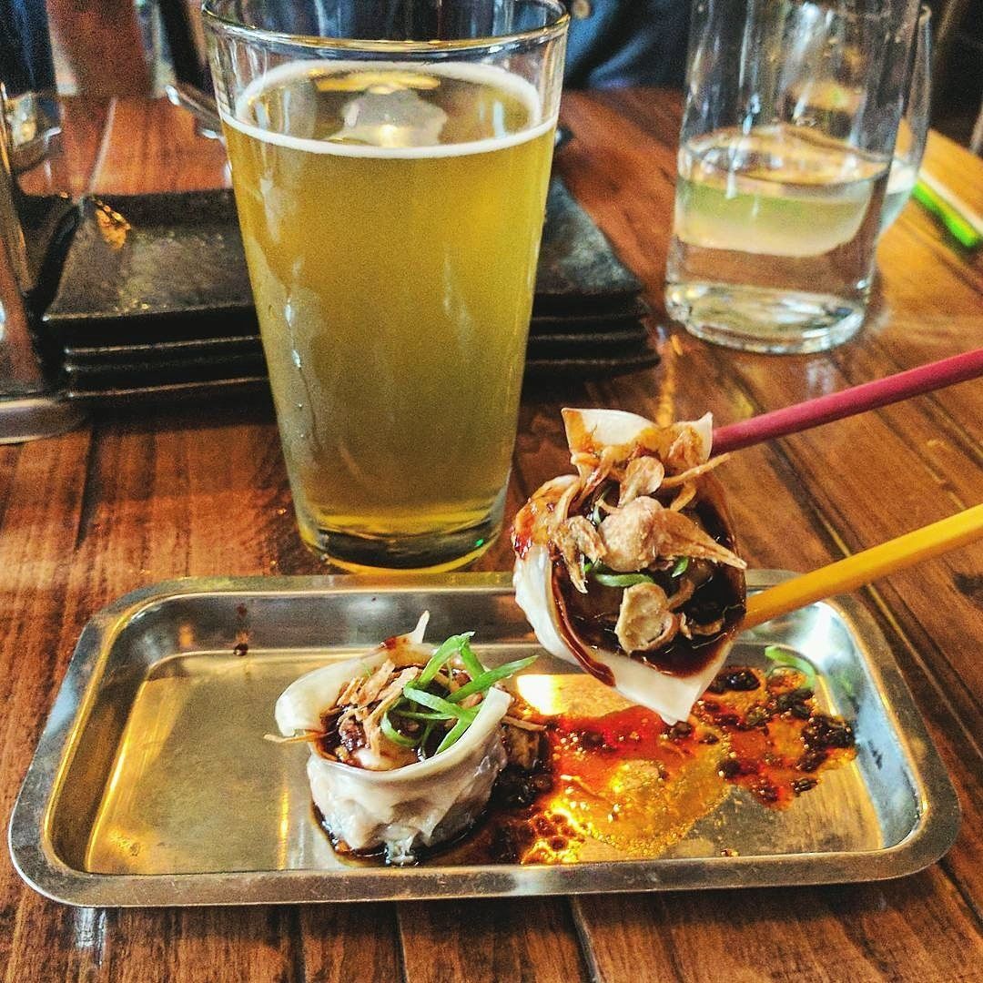 Available at Happy Hour and on the Dinner menu, come fill up on our red-chili pork dumplings and an ice-cold draft! 📸@gents_whodine #repost