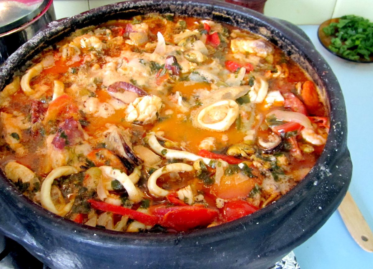 Caldeirada - a stew consisting of a variety of fish and shellfish with potatoes, tomatoes and onions.