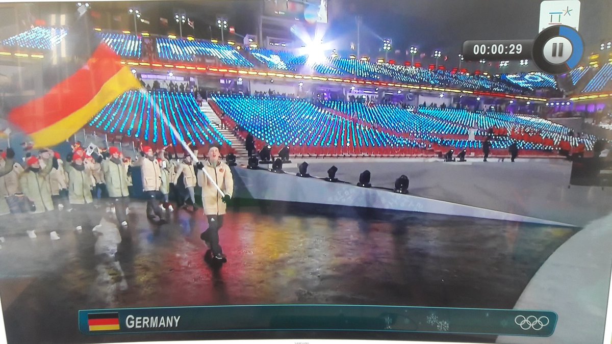 MinPlenSchaefer's tweet photo. Watching the colourful opening of #PyeongchangOlympics2018 #SouthKorea. Fingers crossed for our 156 athletes of #TeamGermany and also for the only SA athlete #ConnorWilson. Good luck and many medals to all of you! https://t.co/6E7yT4A0ql