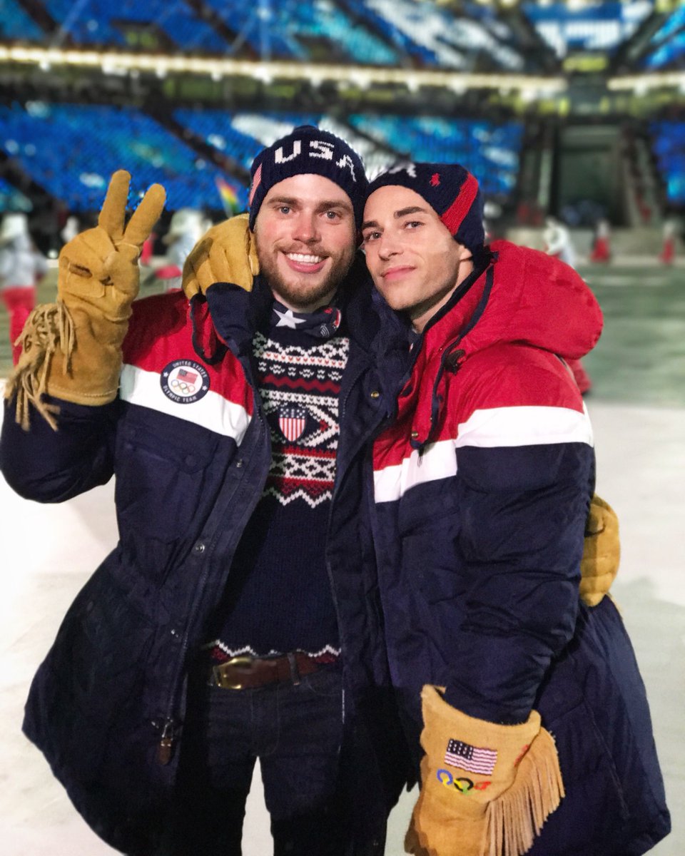 AdamRippon's tweet photo. Tonight I walked in the #OpeningCeremony and got to watch my old friend @Yunaaaa light the Olympic flame. Representing the USA is one of the greatest honors of my life and being able to do it as my authentic self makes it all so much sweeter 🇺🇸🏳️‍🌈🏆🌎❤️🔥 https://t.co/ZypvWkUBjD