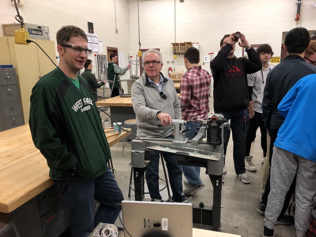 Dr. Flowers sharing his passion, creativity, and talent of woodworking with Mr. Mackowick’s woods 1 students. #nd_CTE <a href="/WFPSchools/">West Fargo Public Schools</a>