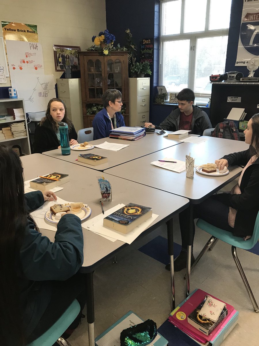 MiddleElkin's tweet photo. Mrs. Swaim’s class began their day in seminar groups discussing the books that each group chose to read. #EMS https://t.co/GGDRIIT7xs