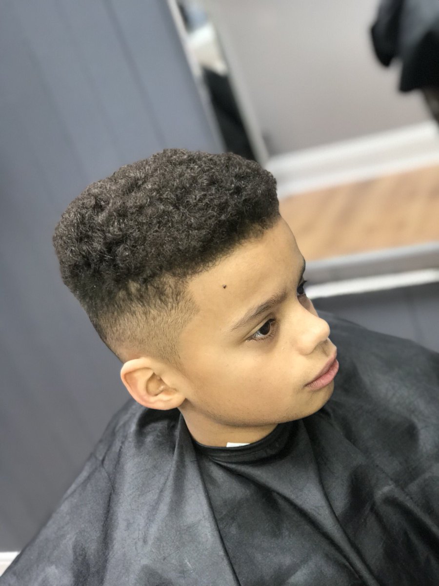 Zero fade with Afro top for this little man today 💈