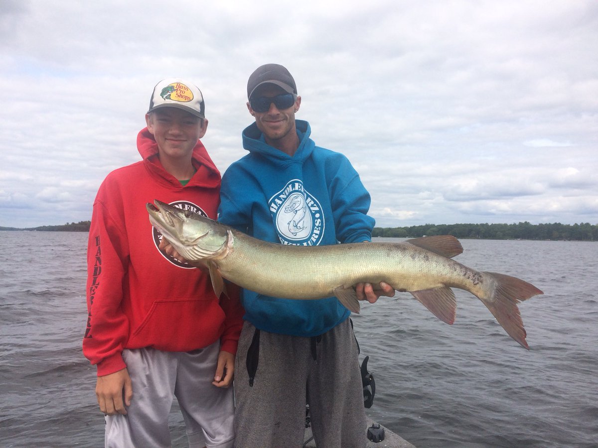 HandlebarzLures's tweet photo. My son and owner of Figure ate Guide Service Sam Ecker with Mikeys first Pigeon lake Musky. He caught it on a D9 Electric Black Handlebarz in-line casting some weedbeds. Awesome times enjoying the summer vacation. #Handlebarz https://t.co/1EPWqujmny