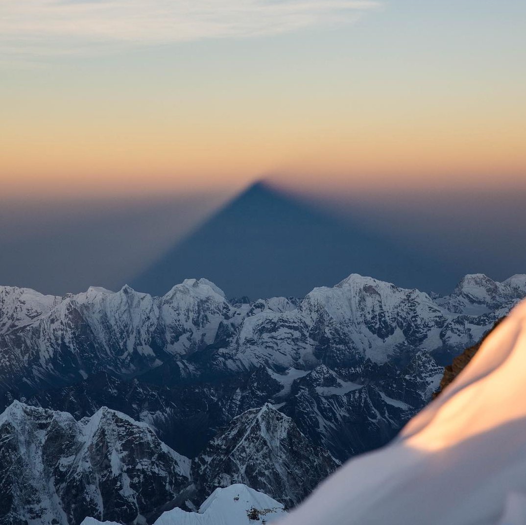 One of our favorite photos from the team's Everest summit last year -- this stunning pic of Everest's shadow shows how much taller the mountain really is! Want to join the next Anywhere+ Everest Base Camp trek? See all the details at buff.ly/2DLFVH3 #JourneyAnywhere #EBC