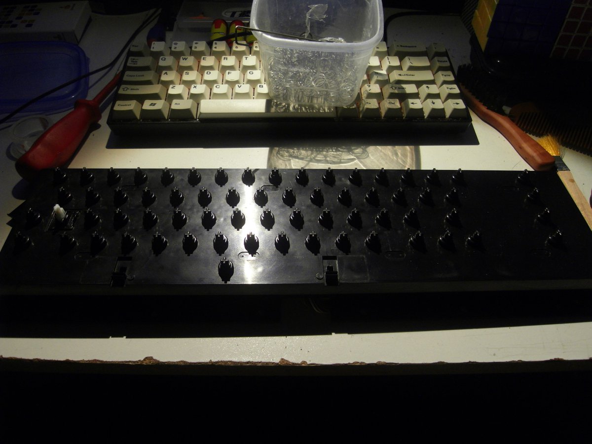 devjock's tweet photo. #c64 keeb update: Put the keys through the dishwasher twice, dried 'em. Springs scotchpadded, degreased, de-rusted and drowned in gun oil (@BallistolUSA), keeb dusted, light anti-greasing. My god, it looks so nice, and it smells like peaches and lemon. #Success #retroPreservation https://t.co/qgg0UjaM86