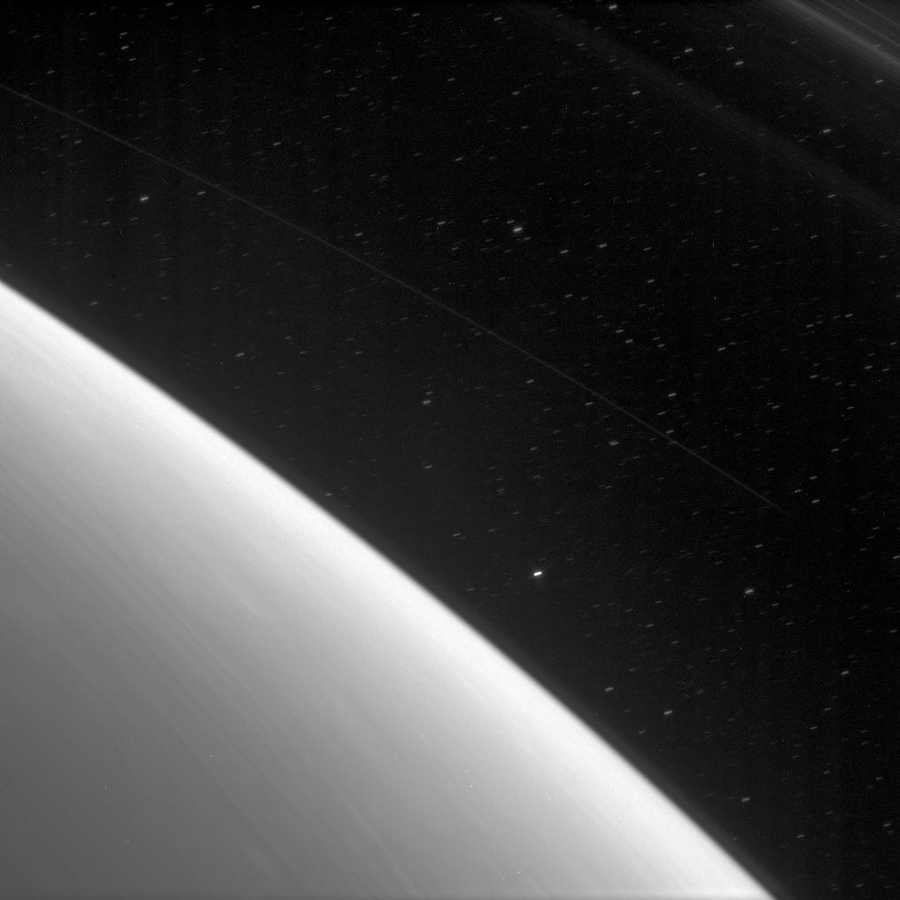 NASASolarSystem's tweet photo. This image, taken 11 years ago today, shows Saturn’s atmosphere, faint features in the D ring and stars drawn out into streaks by the long exposure time. Details: https://t.co/vttW1syDo5 https://t.co/Z0Wky0E2Nb