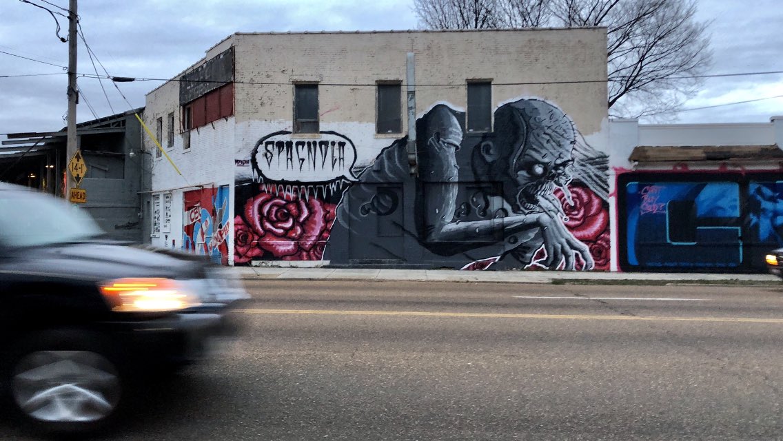 MemphoNewsLady's tweet photo. “The city just destroyed the largest artist collaborative in the state of Tennessee.” - Karen Golightly of Paint Memphis talking w/ reporters about the city removing the wrong murals instead of the Elvis & Zombie murals council members called “satanic.” Both still stand tonight. https://t.co/M4ofgXchoi
