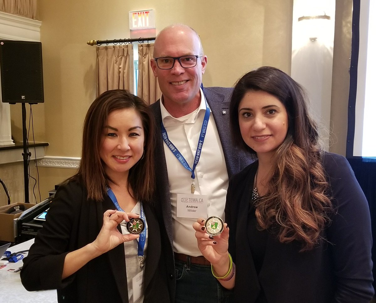 DrPsychNinja's tweet photo. Twitter friends meeting at #TemaWeek! TY for the challenge coin, @wilder_drew. Now @DilnazGarda &amp; I will need to practice our coin slamming skills before the gala ;-) #YouAreNotAlone @TEMATrust @TorontoBTB https://t.co/GjfGhTKB3a