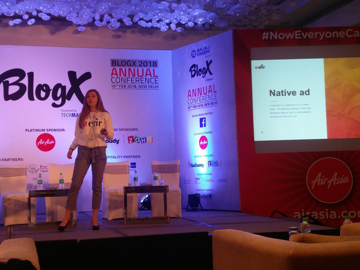 blogxindia's tweet photo. Ms. Inna Rudaya of https://t.co/FcYOoRs6Zw is on stage explaining how as #bloggers you can find new opportunities working with #advertisers. #nativeadvertising #nativeadvertisement #brands #socialmedia #BlogX2018 https://t.co/VzYwItfNIT