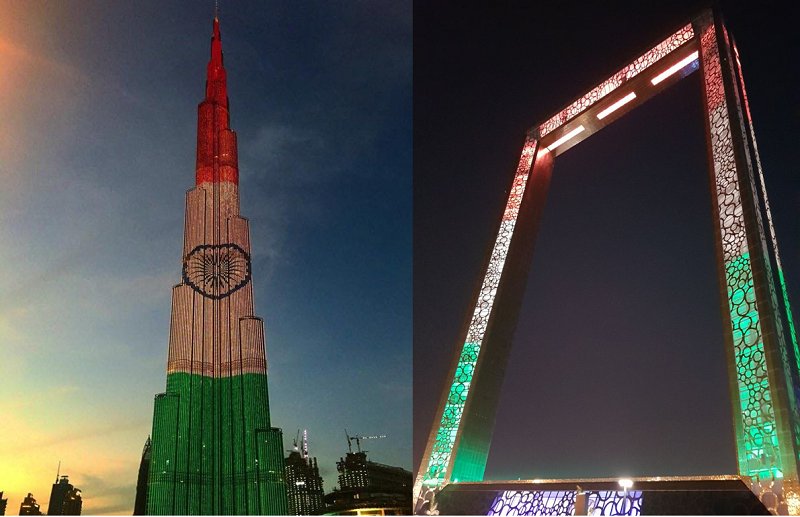 timesofindia's tweet photo. PM @narendramodi in the UAE: Burj Khalifa, Dubai Frame light up in colours of Indian Flag https://t.co/TGSwVGw0DA https://t.co/YPFXLvfsQg