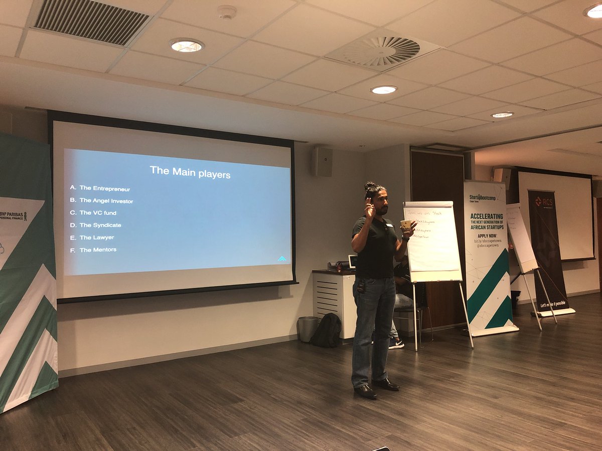 SBCAfriTech's tweet photo. .@zach_cpt presenting a workshop on startups and funding just before the teams start Pitching their ideas. We will be streaming the event live on Facebook soon. #Hack2DayZero #DefeatDayZero #sbcCapeTown https://t.co/HGxxtWJLZo
