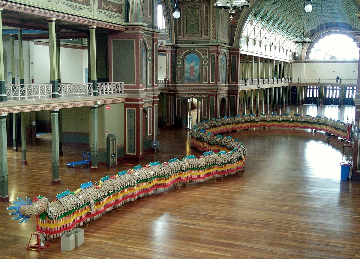 DeanBeckOnAir's tweet photo. The World's longest Imperial Dragon #SunLoong looks stunning, laying in wait at Melb Exhibition Bldg before being paraded through @melbournemuseum forecourt. https://t.co/KW9l74upT1