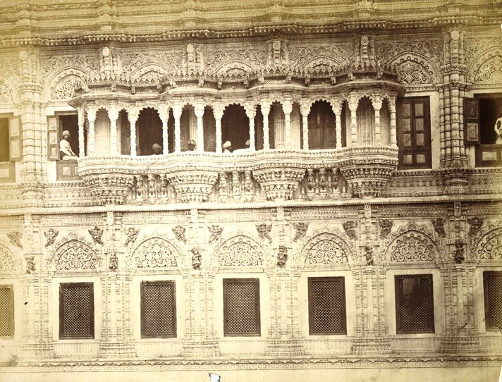 147 years old photo showing perforated stonework &amp; carvings on the arches over windows &amp; balconies of the old palace of #Jamnagar which was known as Navanagar in old time. The City was founded by Jam Raval Jadeja from Kutch in 1540 AD.