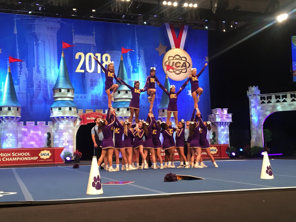 UCAupdates's tweet photo. Exciting and innovative routine from DeSoto Central High School in the Large Varsity DI Finals! 💜💛 #UCAnationals https://t.co/FhViakz96B