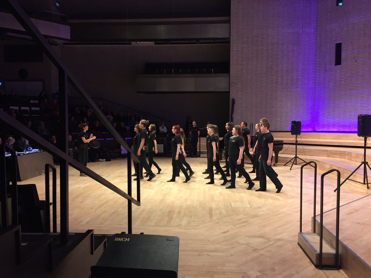 james_b_draper's tweet photo. Receiving a roaring ovation from the audience (and also storming towards the judges’ table) - Enchoir @ LCC perform at @mcrchoralcomp https://t.co/GeQCD8W8Bd