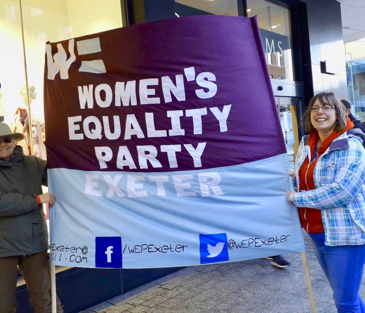 Hanging on tight. The cold,cold wind blew hard and every which way as we arrived to support <a href="/ExeterRising/">1BillionRisingExeter</a>. #Exeter #OneBillionRising