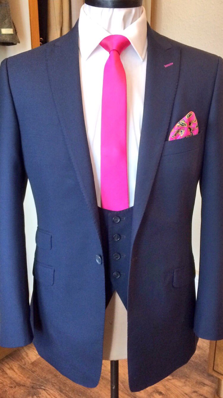 Navy blue and pink tux shop