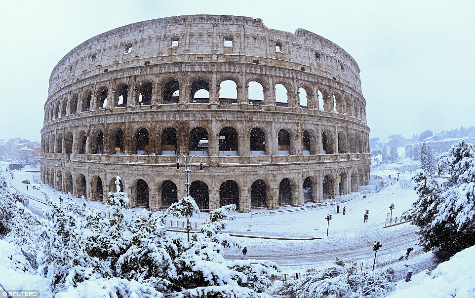 A rare snow storm in Rome on Monday, February 26, 2018, disrupted transport, shut down schools and prompted authorities to call in the army to help clear the streets.  Pictured, the Colosseum.