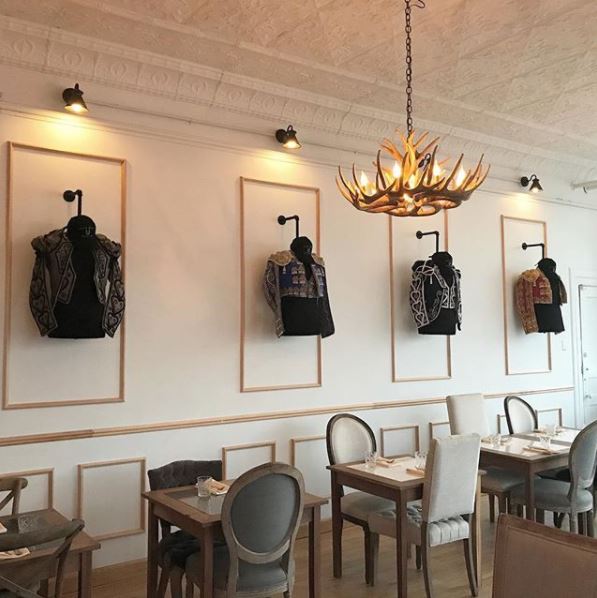 One of our JLI designers took a trip up to Milwaukee this past weekend and discovered this fun and unique décor at <a href="/hotelmadridmke/">HotelMadridMke</a>! Love the intricate matador jackets displayed on the wall in this Spanish restaurant. #JLItravels #spanishdecor #interiordesign #matador