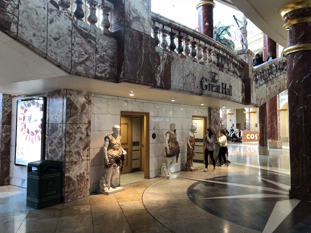 After recovering from the shock of that Pizza Hut and its glaring statues — presumably rigged to shoot lasers from their eyes at dine-and-dashers — I have come across another part of the Great Hall with more tat. And an elephant.  #NinjiAtTheTC