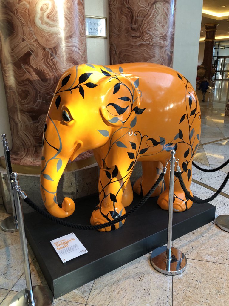 After recovering from the shock of that Pizza Hut and its glaring statues — presumably rigged to shoot lasers from their eyes at dine-and-dashers — I have come across another part of the Great Hall with more tat. And an elephant.  #NinjiAtTheTC