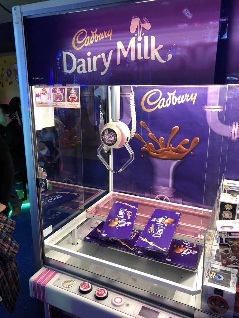 There’s a smattering of arcade machines (including Mario Kart Arcade GP DX), crane games, bowling, dodgems, ticket games, pretty standard fare. There’s VR and some gambling. I’m not getting any closer to those Minions. Sex sells, also, as this Moto GP machine shows  #NinjiAtTheTC