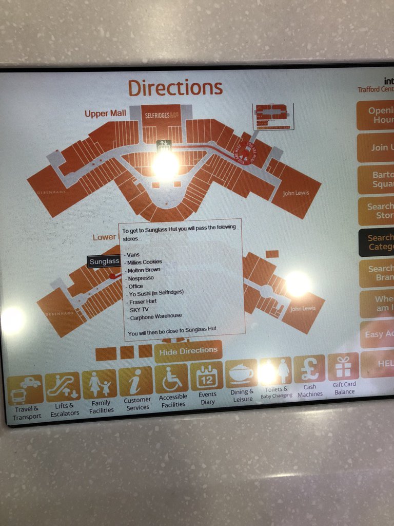These touchscreen guides are unusually well done — the screen is responsive, it will actually give you detailed directions to any store you want  #NinjiAtTheTC
